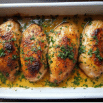 Juicy Garlic Butter Baked Chicken Breast served with parsley garnish