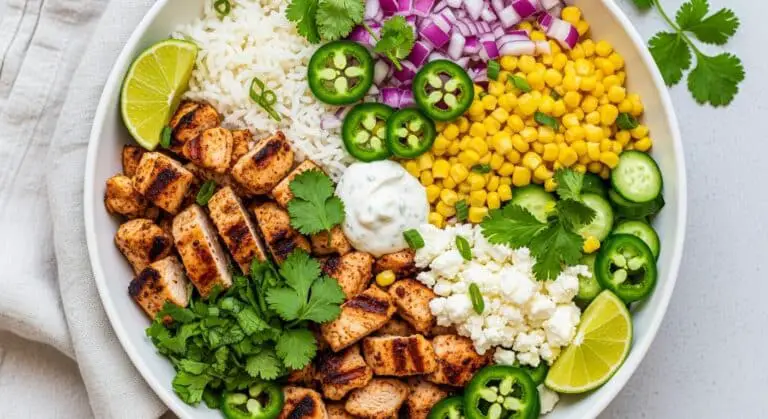 street corn chicken rice bowl in rustic bowl