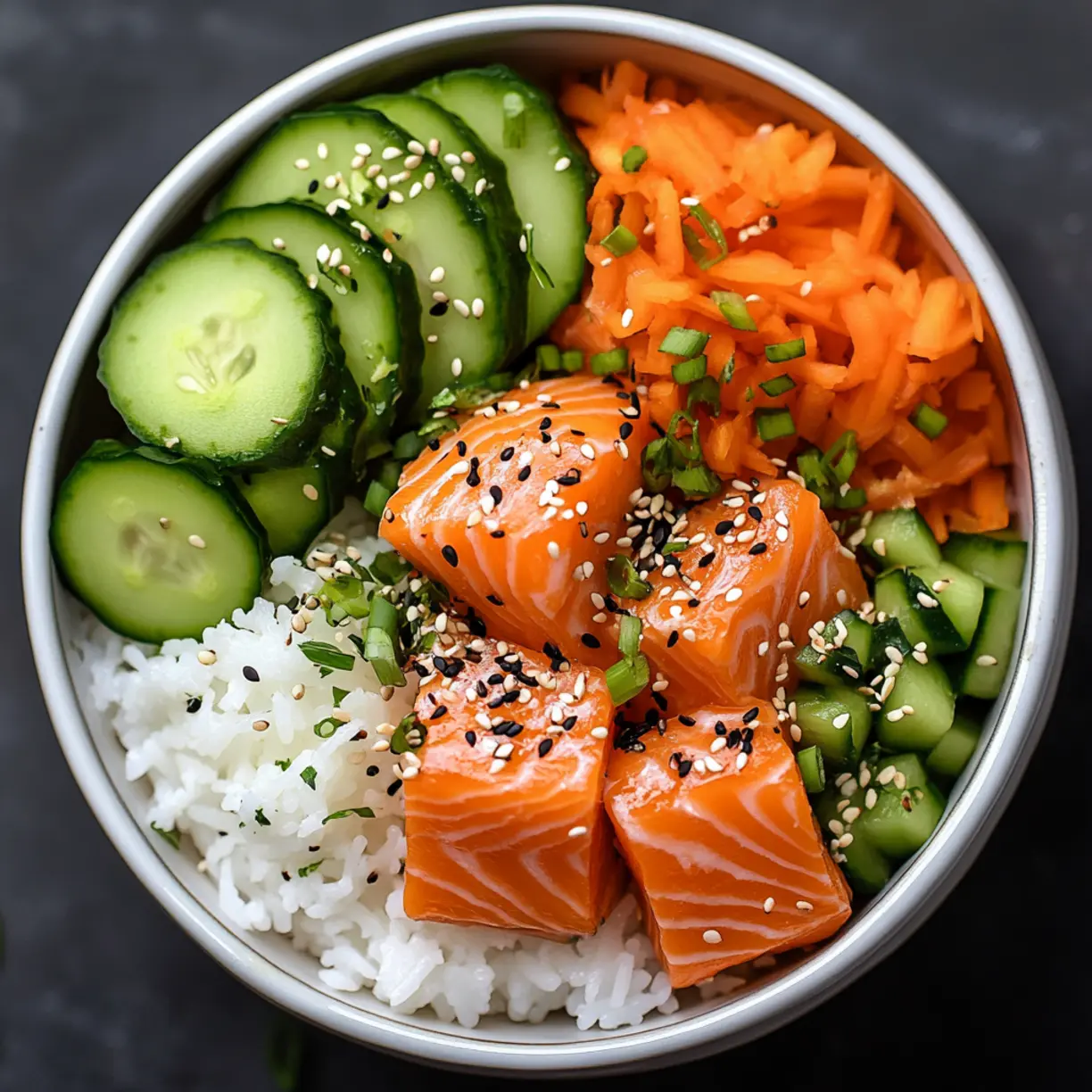 Beautifully presented healthy salmon bowl with colorful vegetables