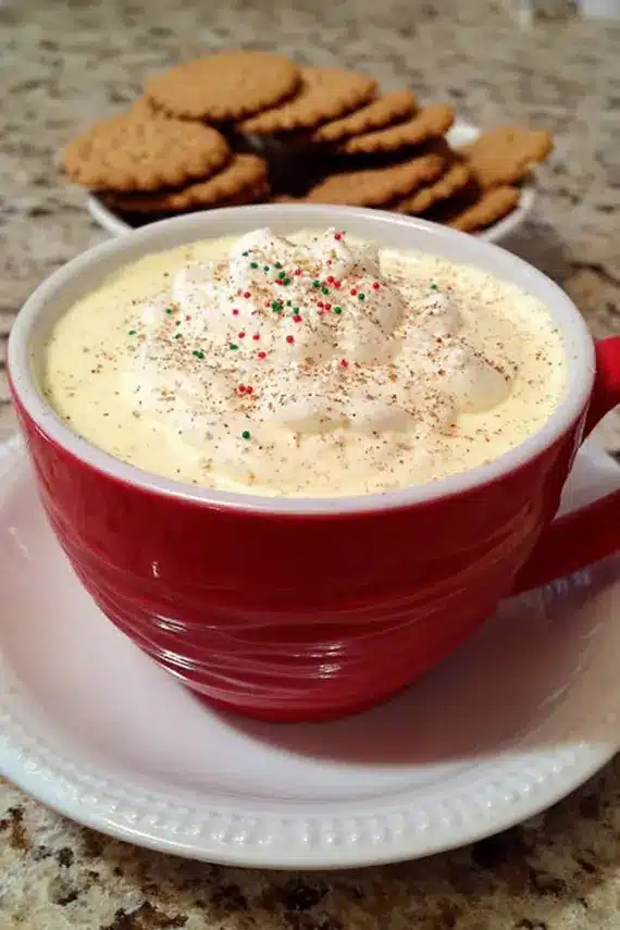 Holiday eggnog dip served with cookies and fruit