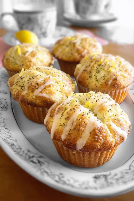Beautifully arranged lemon poppy seed muffins on a brunch table