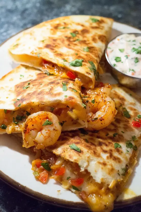 Delicious shrimp quesadilla with melted cheese and golden crispy exterior