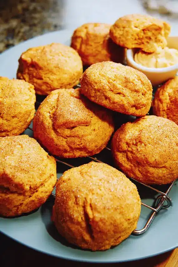 Pumpkin biscuits served with honey butter and apple slices