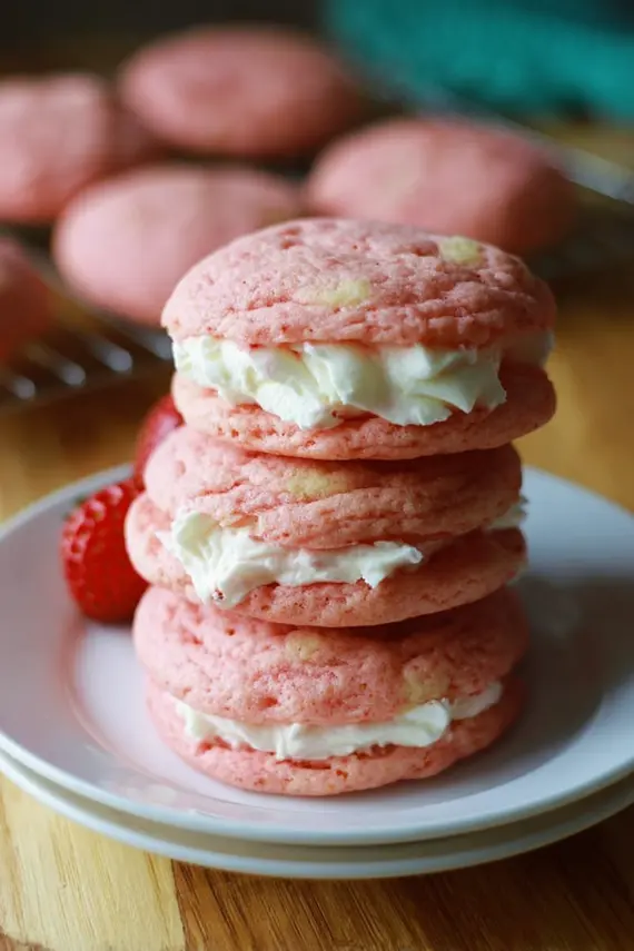 Freshly baked strawberries cream pudding cookies on a cooling rack