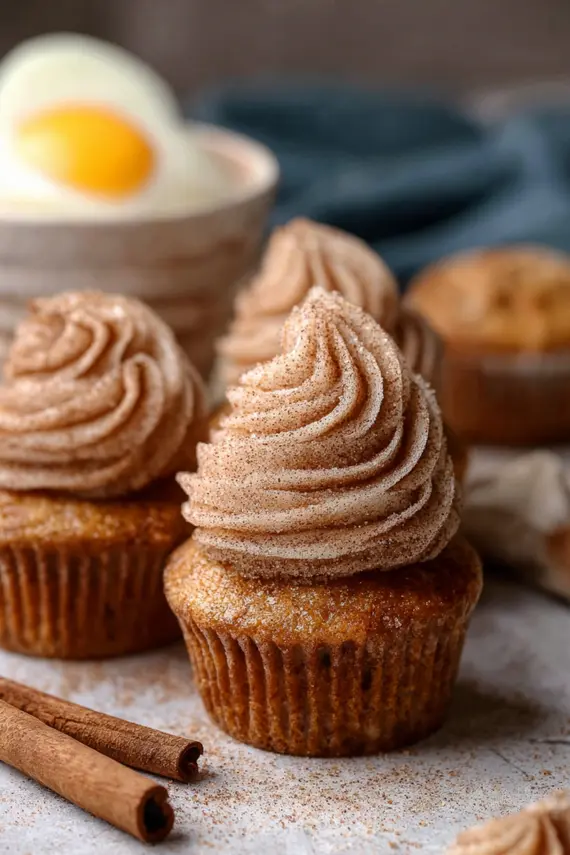 Churro cupcakes with sugar glaze frosting
