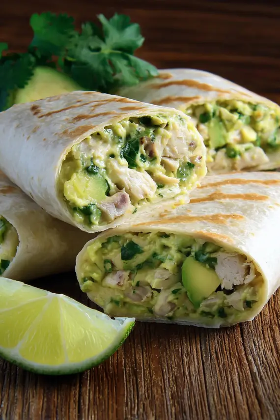 Chicken avocado burritos with fresh ingredients