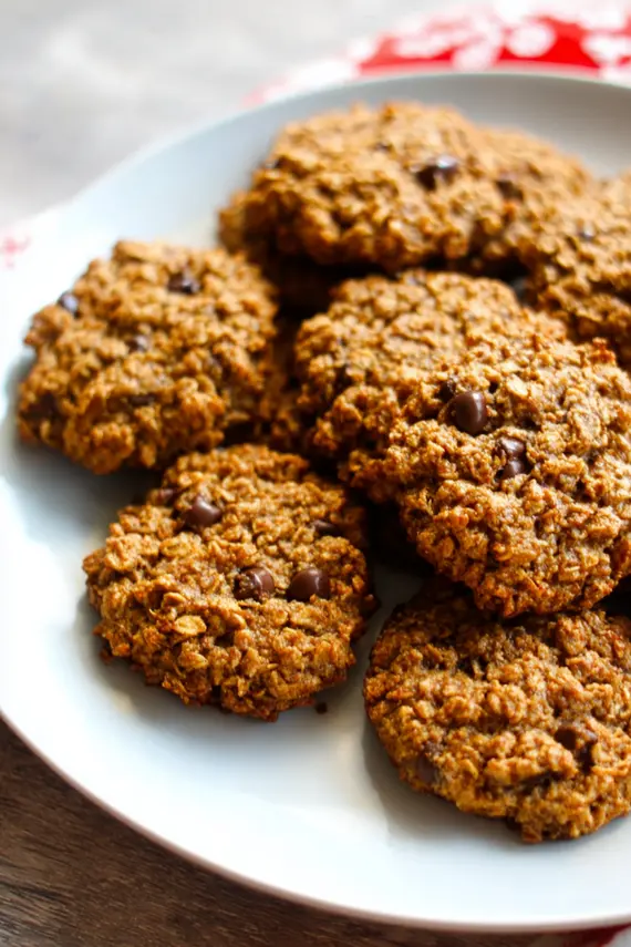 A beautiful serving of gluten free ginger oatmeal cookies with a cup of tea
