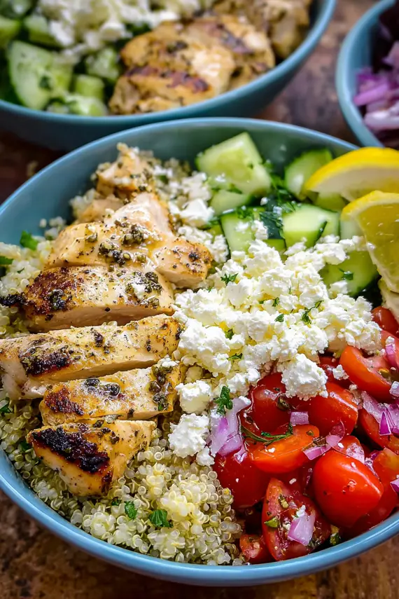 Mediterranean Chicken Bowl with quinoa, grilled chicken, vegetables and feta cheese
