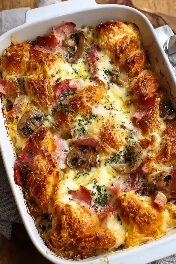 Golden brown Ham Mushroom Croissant Bake with flaky layers and savory filling