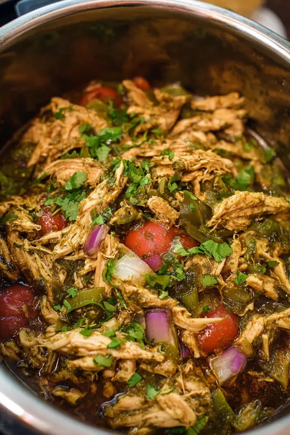 Mexican Poblano Instant Pot Chicken cooking in pressure cooker