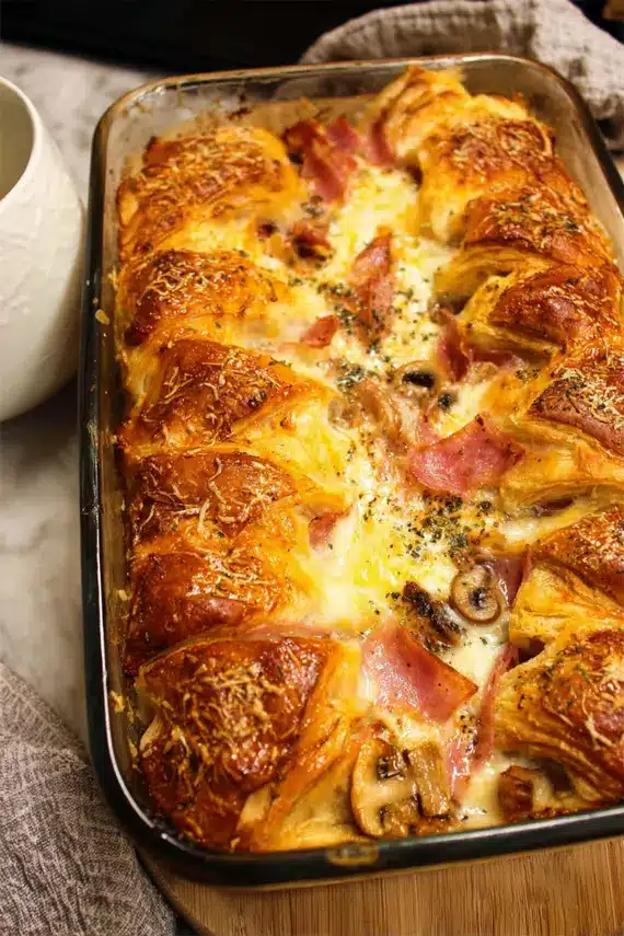 Ham Mushroom Croissant Bake served with fresh fruit and garnishes