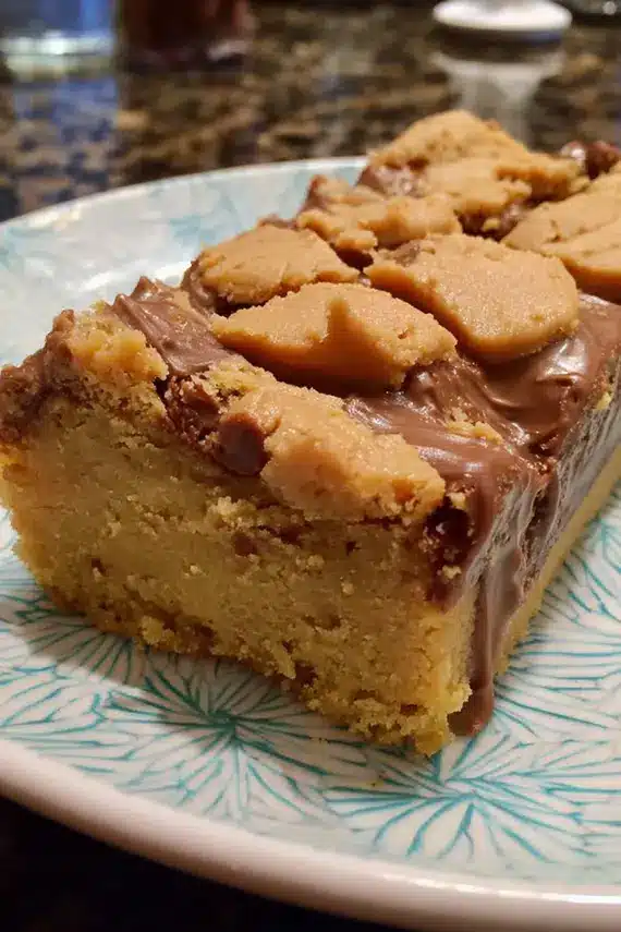 Close-up of creamy peanut butter frosting on sheet cake