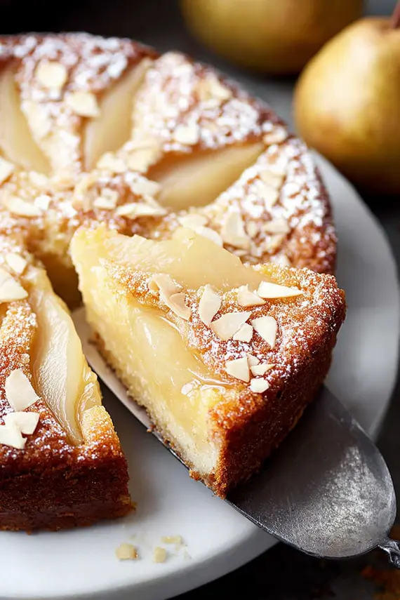 Freshly baked Italian pear cake showing golden crust and tender pear slices