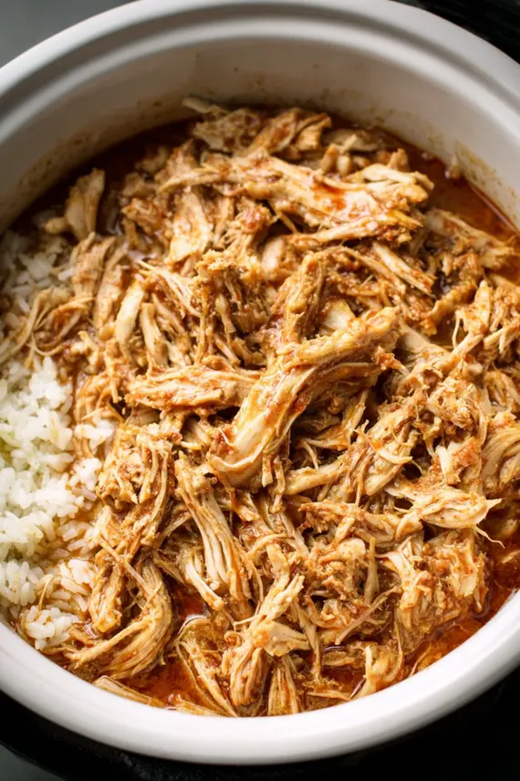 Instant Pot Slow Cooker Pineapple Mexican Shredded Chicken in a bowl with rice
