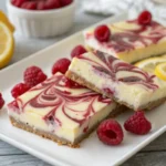 swirled raspberry lemon cheesecake bars