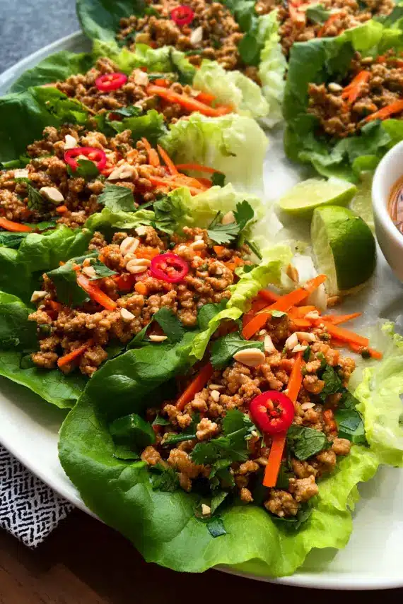 Thai chicken sauce with lettuce wraps serving presentation
