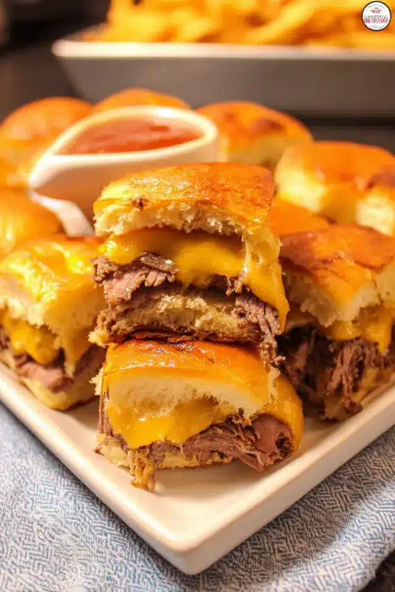 Beef cheddar sliders served on a platter as party appetizers