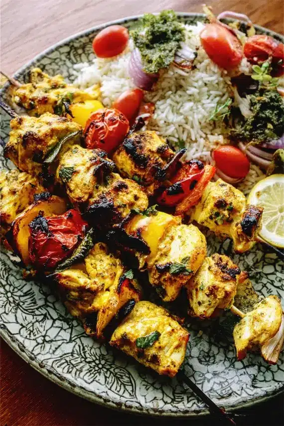 Perfectly grilled Persian chicken kabobs with charred edges and juicy centers